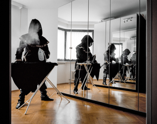 Illustration for article titled Photographs of cosplayers at home capture both the person and the mask